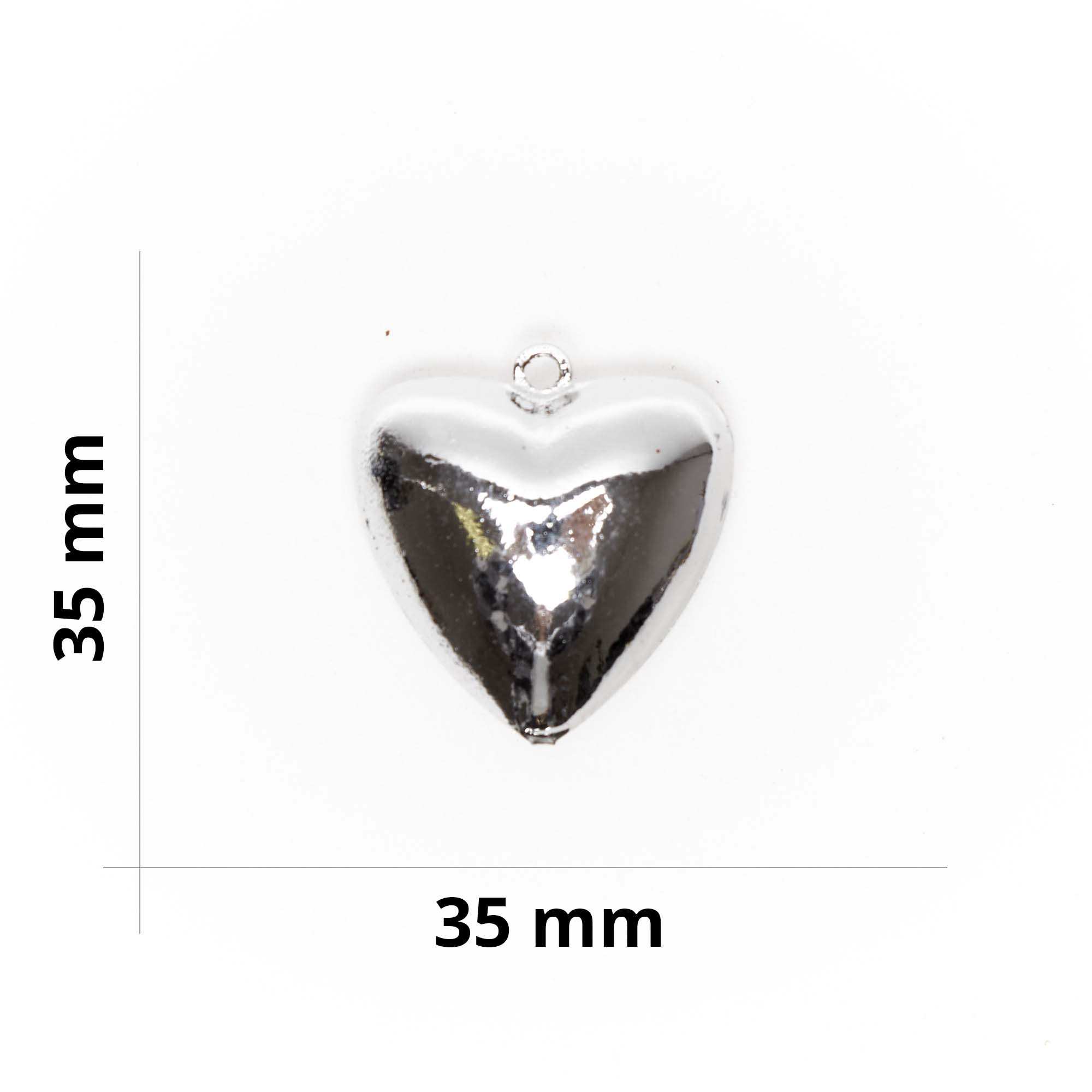 Conf. da 12 pz - H.35 mm - Campanellini a forma di cuore in metallo